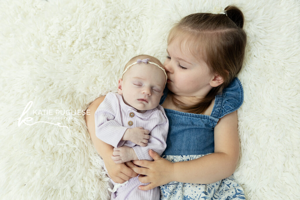 Newborn baby photographed at home in Connecticut with a calm, natural style
