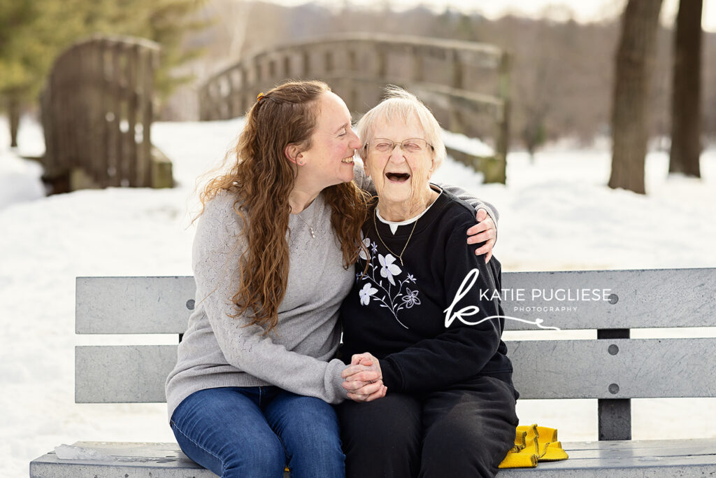 Winter family photography session in Connecticut with snow-covered landscape